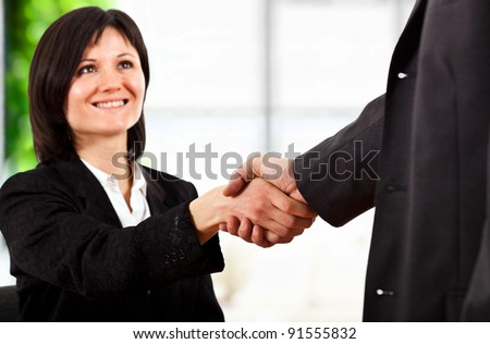 Woman giving handshake