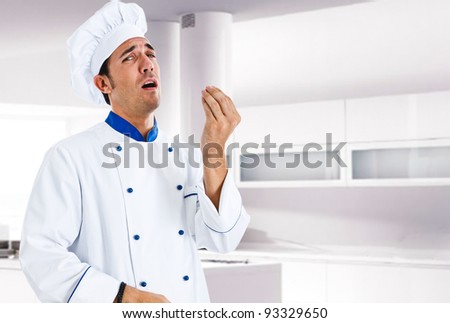 Portrait of an italian chef in his kitchen