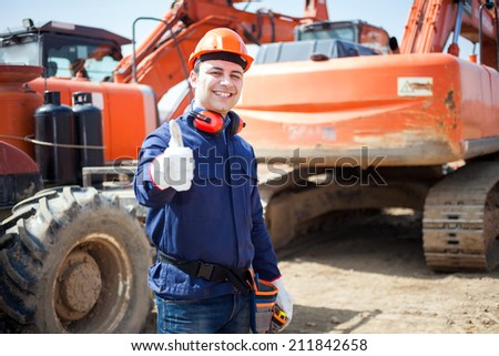 Portrait of  an happy worker in a construction site