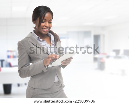 Business woman using a tablet computer