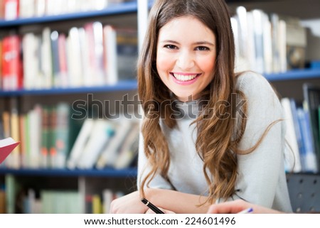 Portrait of a woman in a library