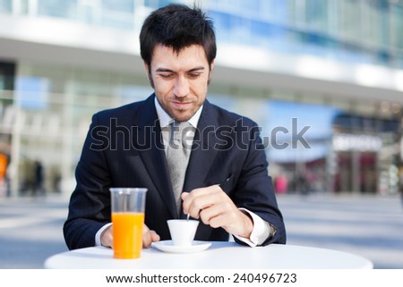 Businessman having breakfast