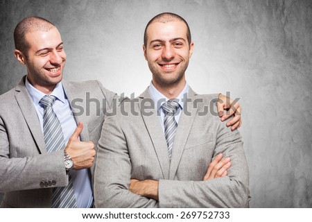 Smiling businessman congratulating with himself 商業照片 © 