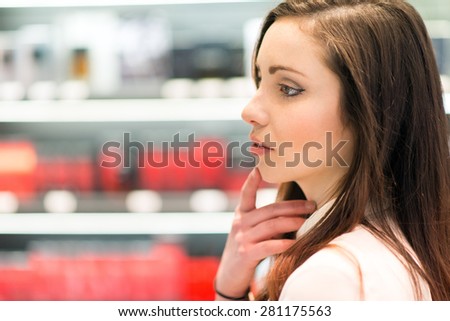 Young woman shopping in a beauty shop
