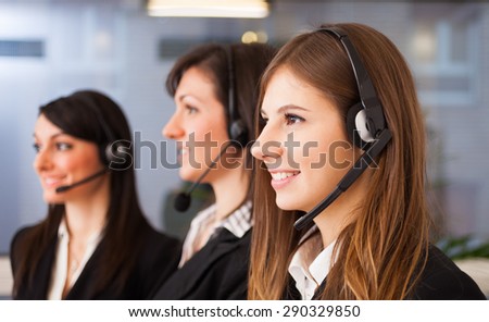 Portrait of three customer representatives at work