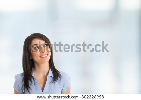 Woman looking up, lots of copy-space for your product or text