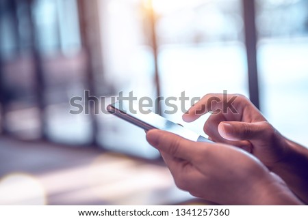 Similar – Image, Stock Photo Person holding phone macro