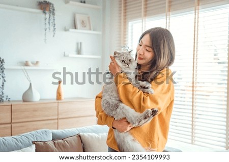 Image, Stock Photo Persian woman at home while looking through the window