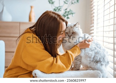 Similar – Image, Stock Photo Persian woman at home while looking through the window