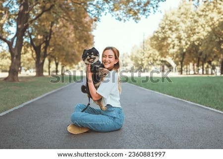 Similar – Foto Bild Frau hält Hund zu Hause