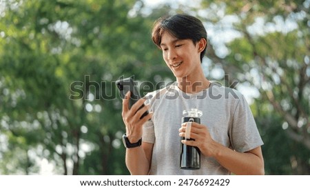 Similar – Image, Stock Photo A young man is standing alone in the landscape, but the sky is cloudy. Anyway.