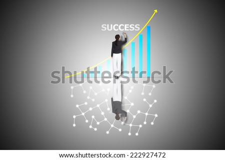 business woman drawing success graph