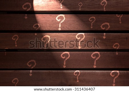 question mark text on wooden