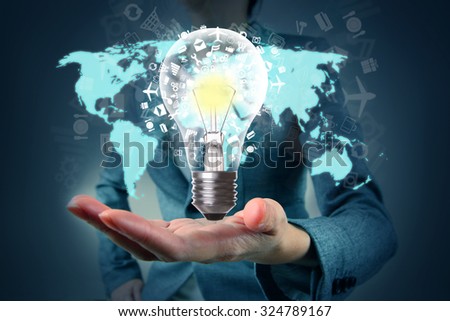 Light bulb in hand with map and application