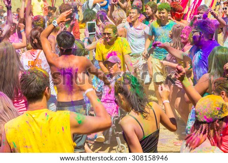 KAZAKHSTAN, ALMATY - AUGUST, 15, 2015: Invalid among people celebrates Holi holiday at sixth ethnic festival FourE