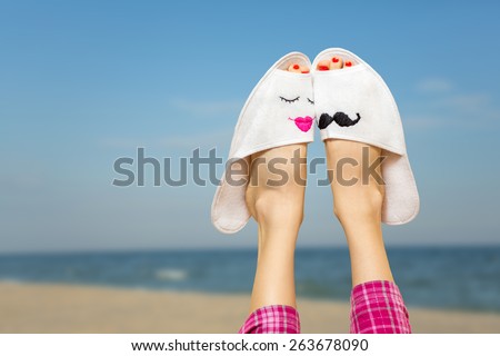 Loving couple legs on the beach. Dreaming about summer beach love story and new boyfriend concept