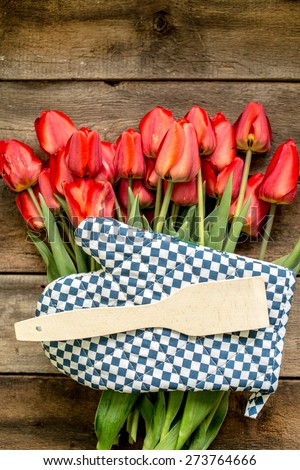 Spring flowers. March 8th, mother\'s day, valentine\'s day, International Women\'s Day, congratulate. focus on glove and tulips