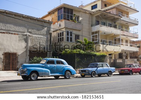 HAVANA, CUBA - DECEMBER 7, 2011: There are still lots of old American cars in Havana. Russian cars from the 1970\'s and 1980\'s are also quite common.