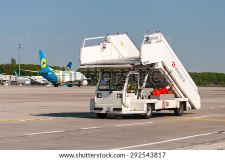 KIEV, UKRAINE - MAY 20, 2015: Mobile gangway for airplanes at Borispol International Airport on May 20, 2015 in Borispol, Ukraine