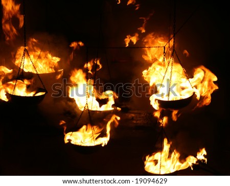 Fire torchs on a chain