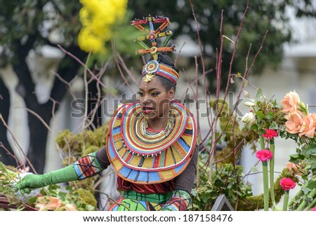 Nice - February 23: Female Entertainer in African Costume at the Nice Flower Carnival on February 23, 2013 in Nice, France
