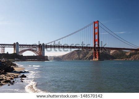 View from the rocky coastline across the Bay and Golden Gate Bridge  California on a clear sunny day
