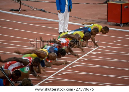 BEIJING - AUGUST 18: Start of Men\'s 100 meter sprint race where Usain Bolt sets a new world record at the 2008 Summer Olympic August 18, 2008 in Beijing, China.