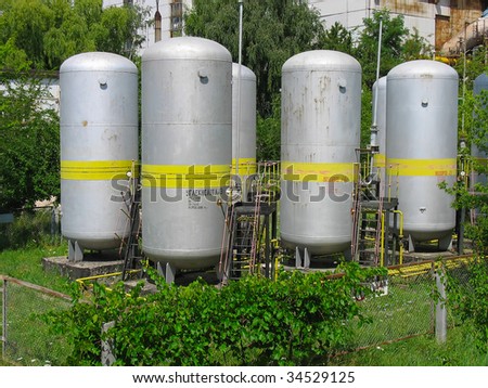 Industrial chemical tanks at a power plant