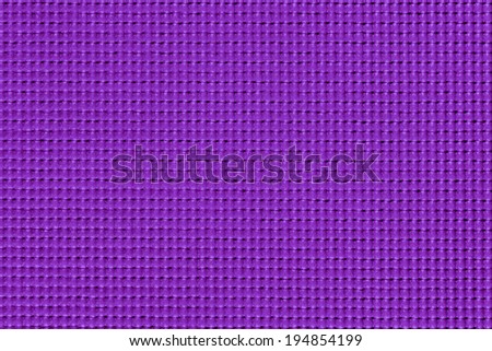 Purple yoga mat texture background.