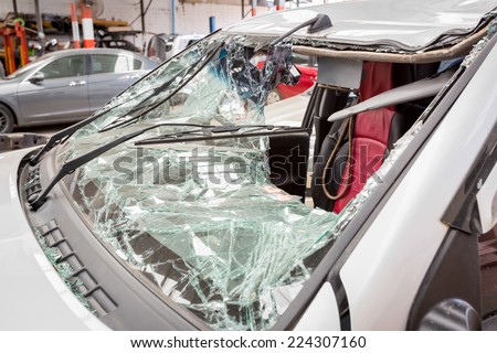 the broken windshield in car accident.