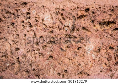 Red brick texture macro closeup, old detailed rough grunge textured copy space background, vertical grungy weathered stained vintage cracked backstein brickwork cut pattern