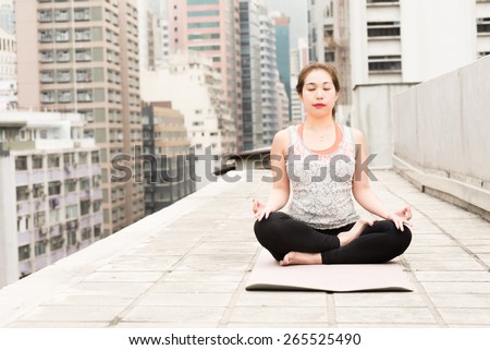 Yoga Position on a Rooftop