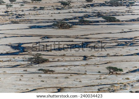 An Israeli oil Spill In December 2014, an oil spill occurred near Eilat, Israel, with  3-5 million liters of crude oil leaking from a breached pipeline, contaminating the Evrona nature reserve.