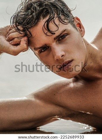 Similar – Foto Bild Young Handsome Male Model mit Curly Hair und Krawatte außerhalb