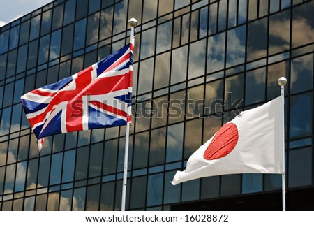 Foreign Trade, Great Britain and Japanese Flags against Glass Building