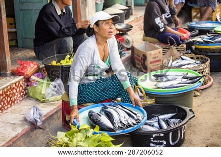 PENIDA ISLAND, INDONESIA - JUNE 13.2015:   woman at the market. Nusa Penida June 13. 2015 Indonesia