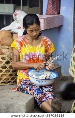 PENIDA ISLAND, INDONESIA - JUNE 21.2015:  young woman, village Toyopakeh, Nusa Penida June 21. 2015 Indonesia