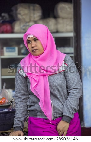 PENIDA ISLAND, INDONESIA - JUNE 21.2015:  Unidentified woman Muslim, village Toyopakeh, Nusa Penida June 21. 2015 Indonesia