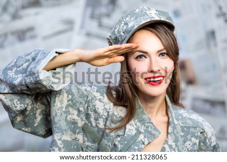 Old style portrait of an enthusiastic brunette army pin-up girl wearing uniform saluting for enrollment at a new recruit office
