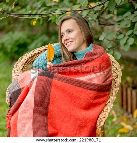 Autumn romantic woman in autumn garden