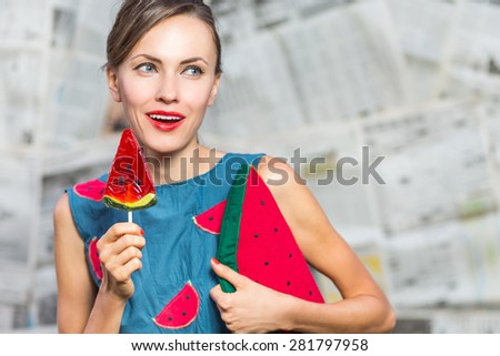 Watermelon beauty woman over vintage newspaper background