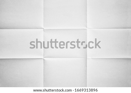 White paper folded in nine fraction background Foto stock © 