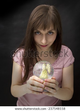 Young woman with magic gypsy ball