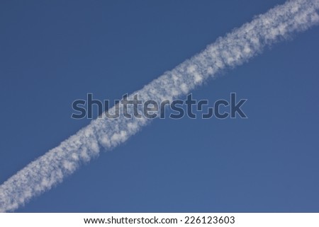 Next plane.\
This trail flying plane formed by the products of fuel combustion engines.