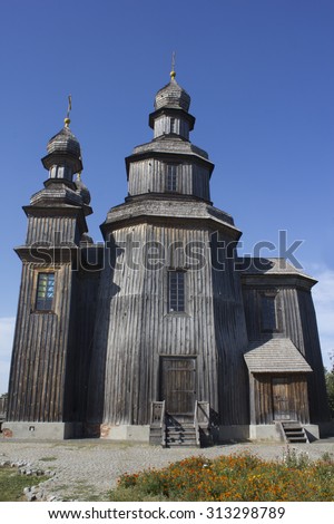Wooden church. Orthodox church. In the years of atheism in her filming the movie \