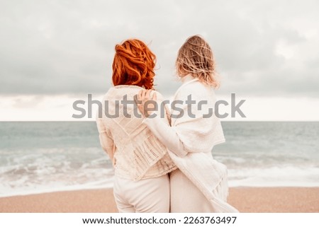 Similar – Image, Stock Photo Happy middle aged lesbian couple hugging outdoors