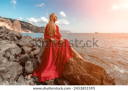 Similar – Image, Stock Photo Woman sitting near waving sea