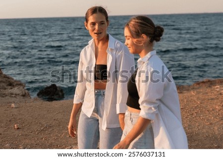 Similar – Image, Stock Photo Blue hour, happy laughter: Woman with short hair looks into the camera with amusement