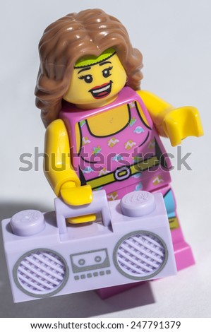 NARVA, ESTONIA - JANUARY 27: A Lego toy of a lady fitness instructor in a sportive costume and radio in Narva, Estonia on January 27