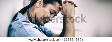 Similar – Image, Stock Photo Sad, exhausted doctor sitting in a dark room